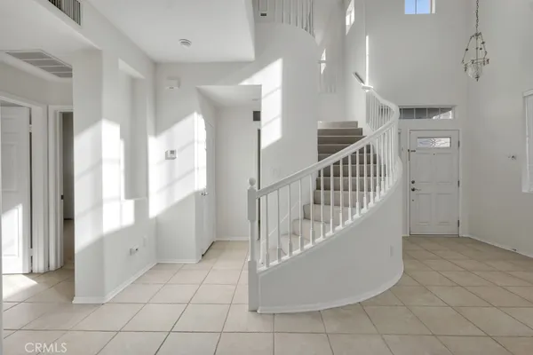 a view interior of a house with entryway and windows