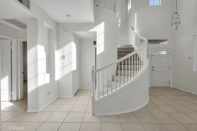a view interior of a house with entryway and windows