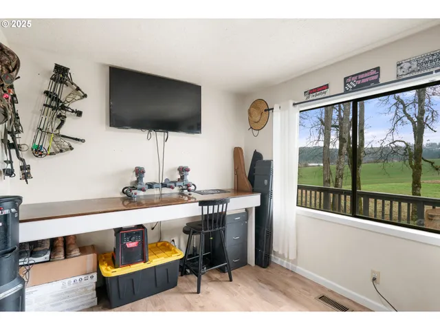 a kitchen with a refrigerator and a stove
