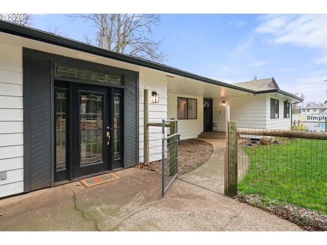 a house view with a backyard space