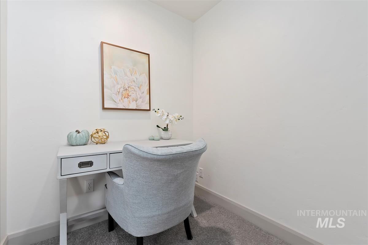 5932 West Quintale Drive Meridian, ID 83646 - Photo 15 of 40 Carpeted home tech space on stair landing with baseboards