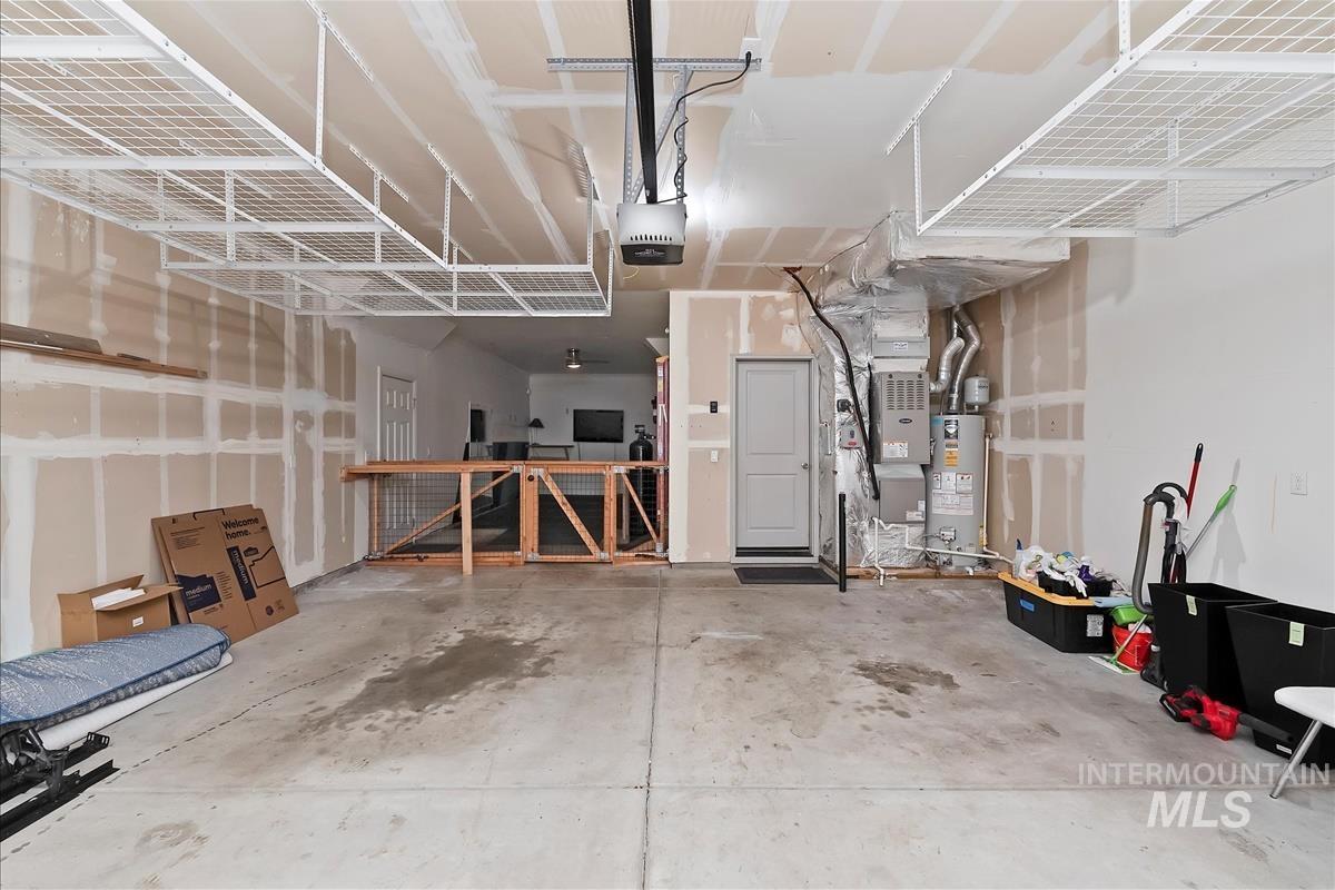 5932 West Quintale Drive Meridian, ID 83646 - Photo 38 of 40 Double Deep garage with dog run and set up for home gym.