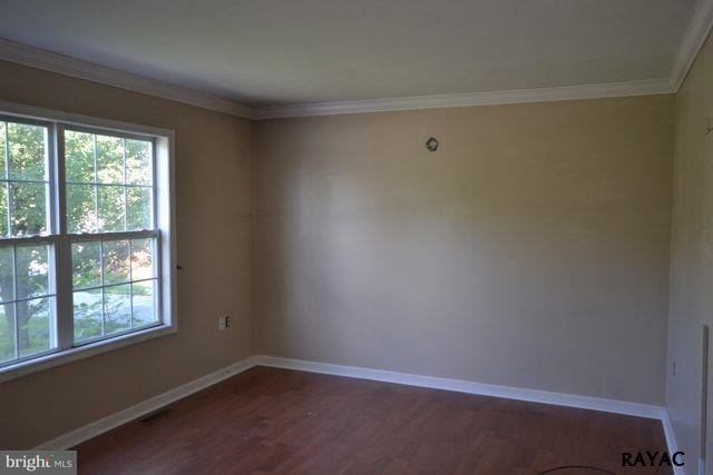 104 Ruel Avenue Hanover, PA 17331 - Photo 5 of 11 an empty room with a window
