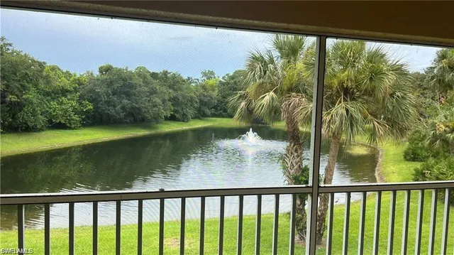 a view of a lake from a balcony