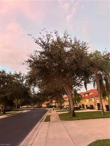 a view of city street with mountain view