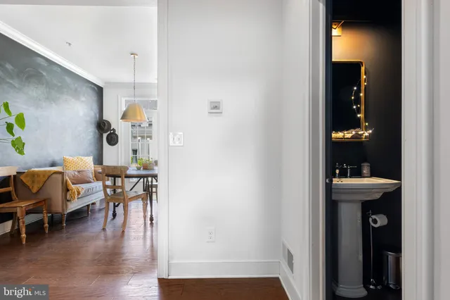 a view of a livingroom with furniture and wooden floor