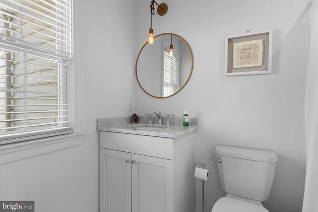 a view of a backyard with sitting area