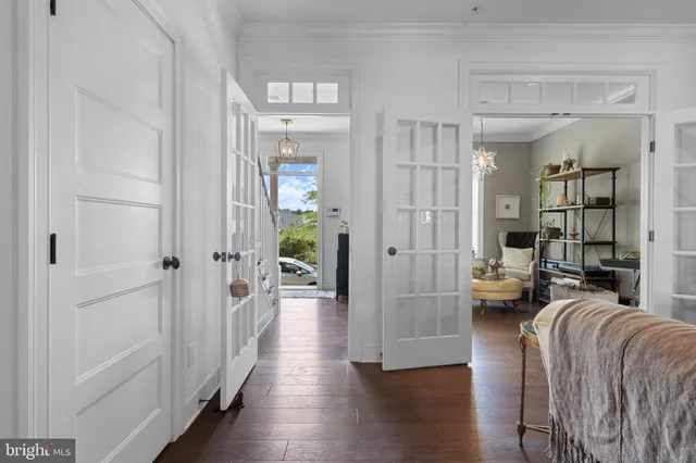 a view of a livingroom with furniture and hardwood floor