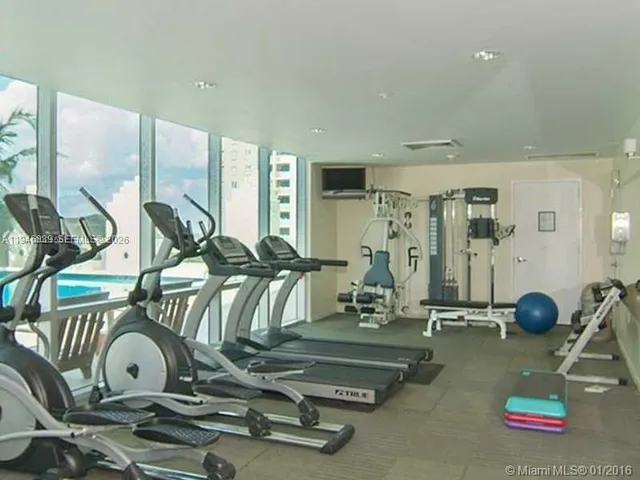 a view of a room with gym equipment