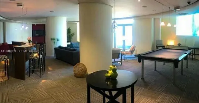 a workspace with furniture and window