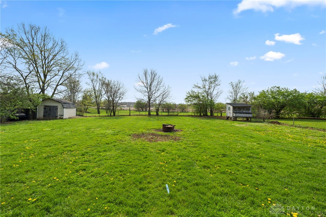 8969 Franklin-Trenton Road Franklin, OH 45005 - Photo 12 of 49 Expansive green space offers a serene escape, perfect for outdoor living and entertaining.