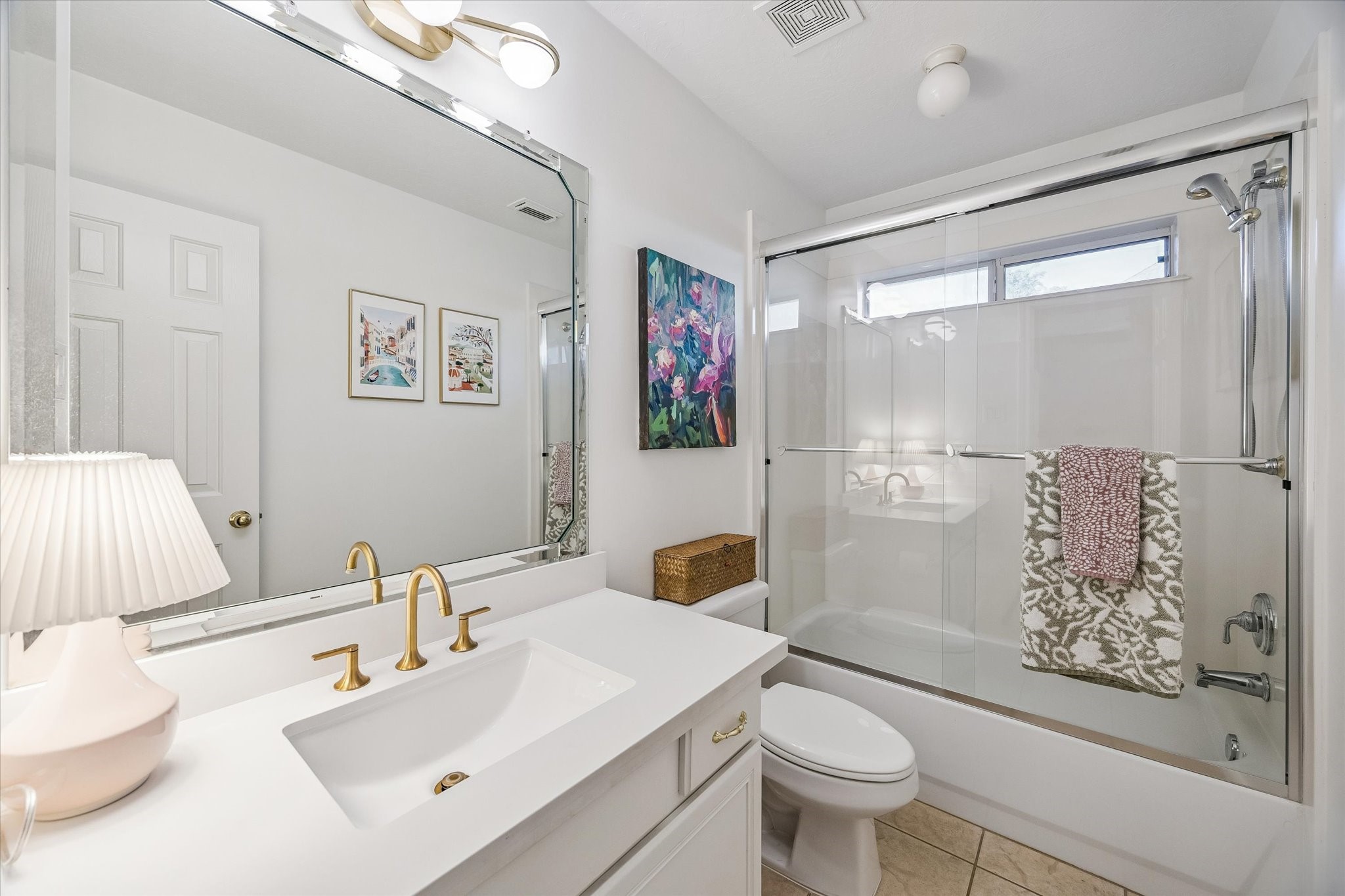 6507 Haughton Court Spring, TX 77389 - Photo 11 of 24 a bathroom with a sink toilet and shower