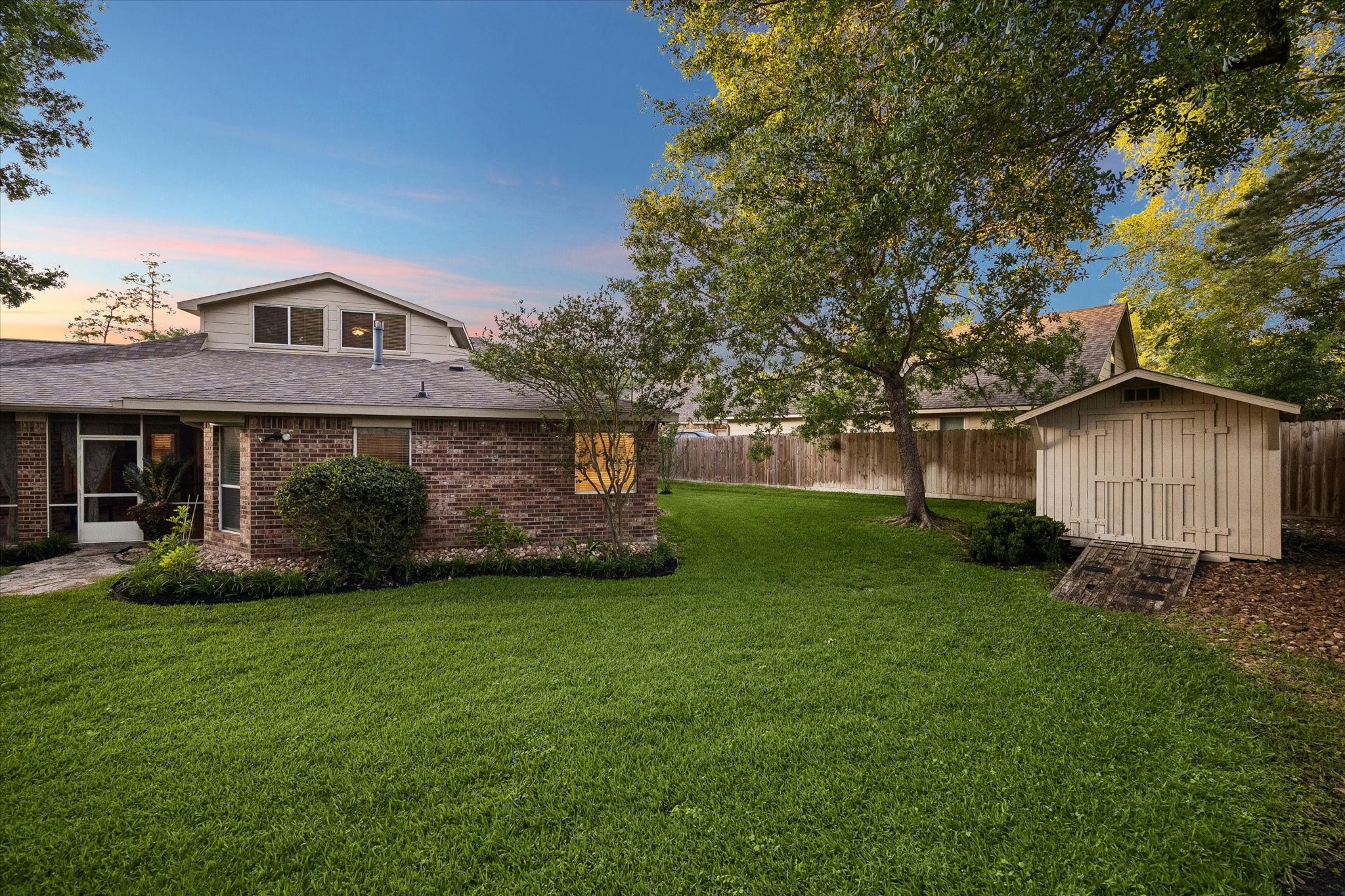 6507 Haughton Court Spring, TX 77389 - Photo 22 of 24 a front view of a house with a yard