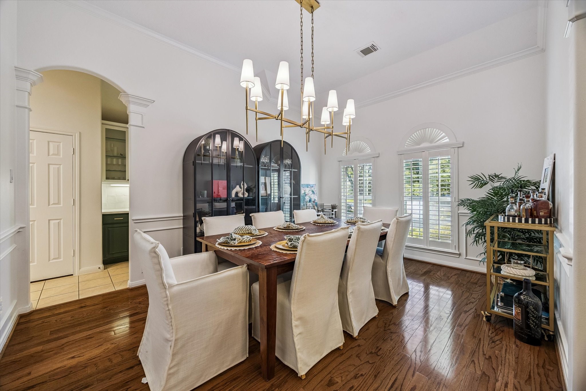 6507 Haughton Court Spring, TX 77389 - Photo 4 of 24 a view of a dining room with furniture window and wooden floor