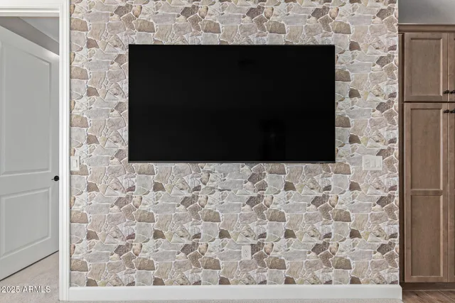 a kitchen with a sink and refrigerator