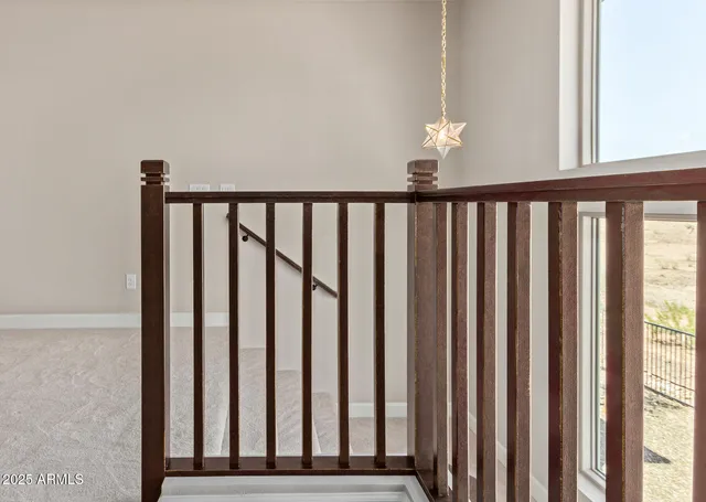 a view of an empty room with a closet