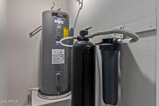 a bathroom with a double vanity sink and mirror