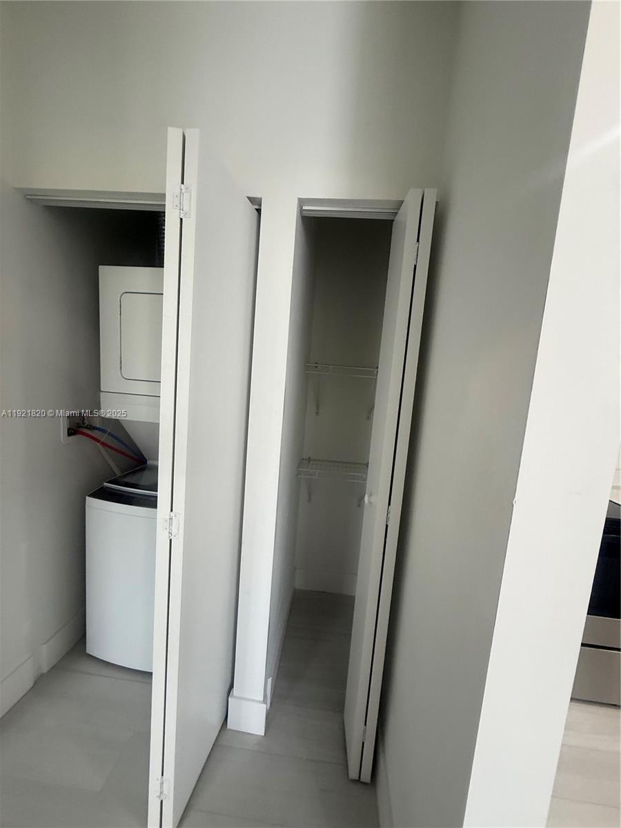 909 East 24th Street, Unit 403 Hialeah, FL 33013 - Photo 9 of 20 a view of walk in closet