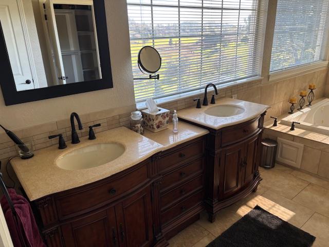 2579 Otter Trail Cool, CA 95614 - Photo 22 of 53 a bathroom with a sink and a mirror