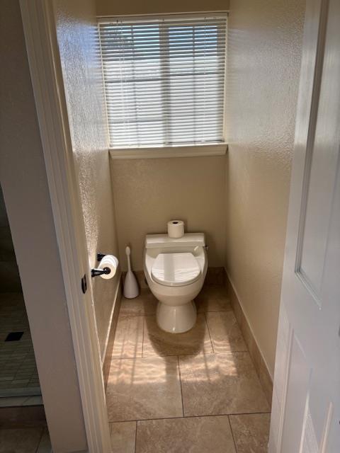 2579 Otter Trail Cool, CA 95614 - Photo 28 of 53 a bathroom with a toilet and a sink