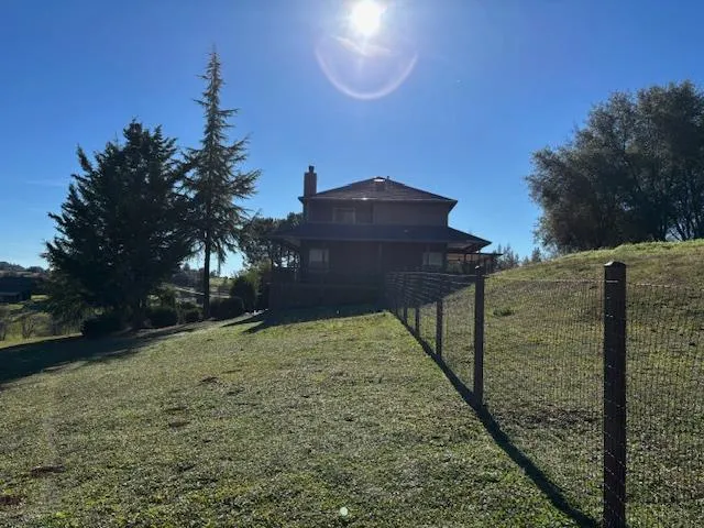 a view of a yard in front of house