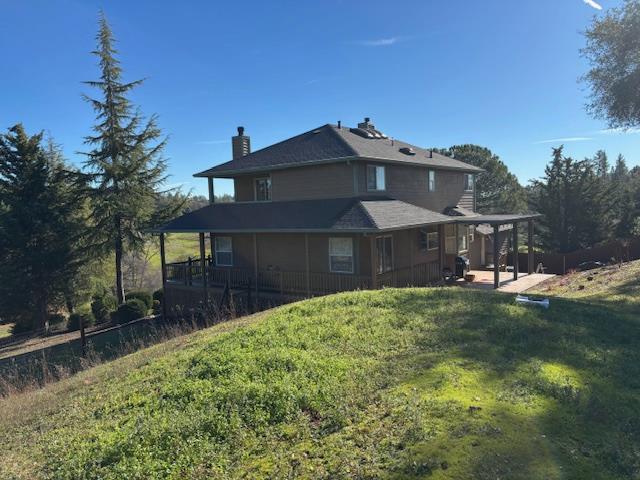 2579 Otter Trail Cool, CA 95614 - Photo 50 of 53 a front view of a house with a yard