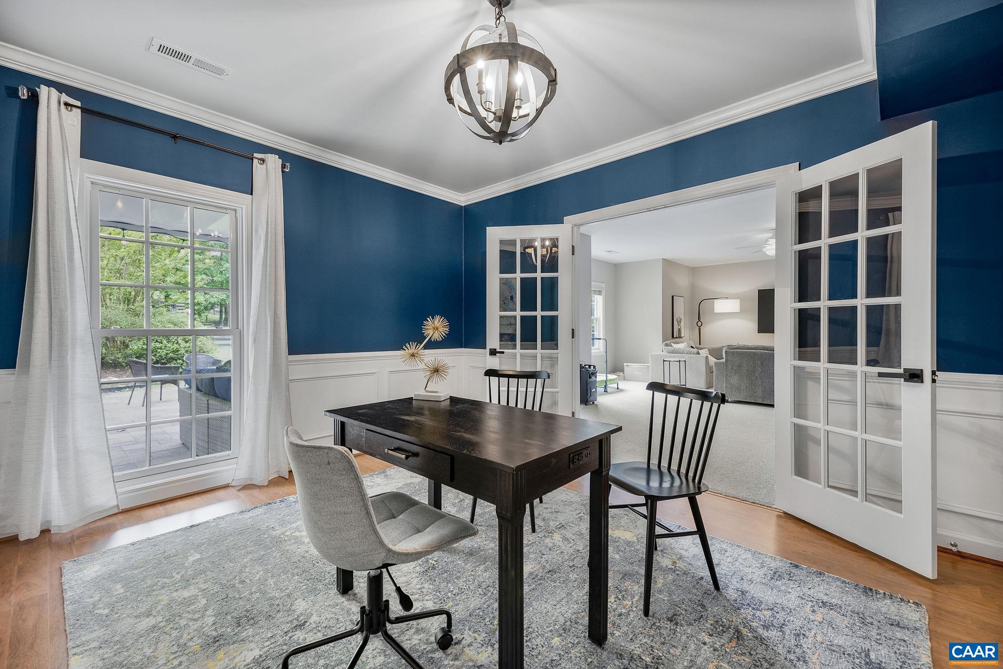 3399 Darby Road Keswick, VA 22947 - Photo 49 of 73 a view of a dining room with furniture window and wooden floor