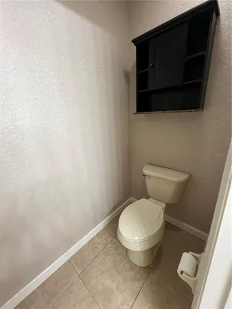 a view of a hallway with staircase