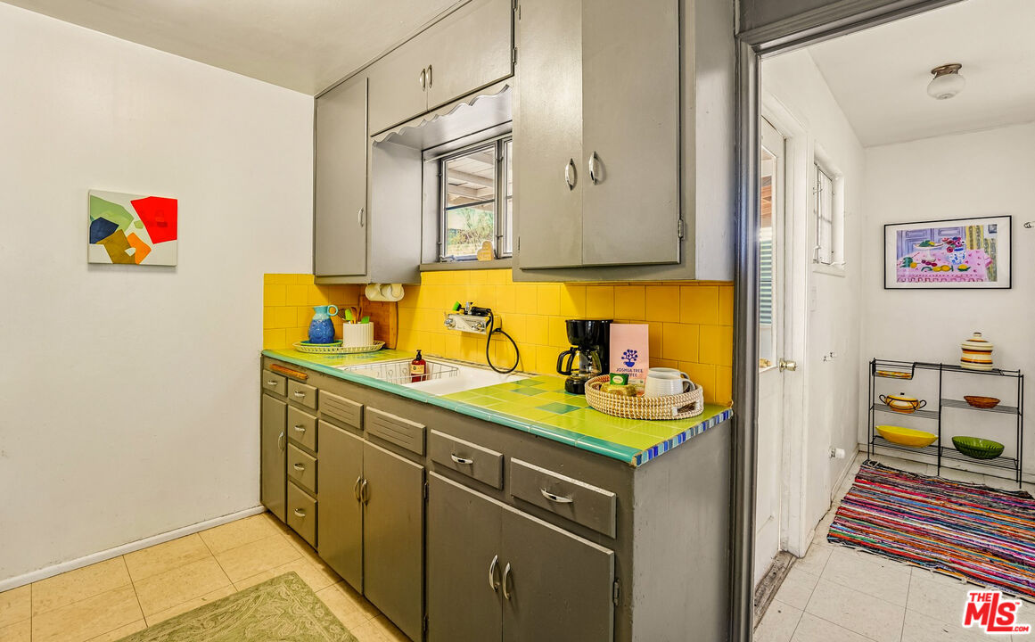 61855 Valley View Circle Joshua Tree, CA 92252 - Photo 23 of 59 a bathroom with a sink and a mirror