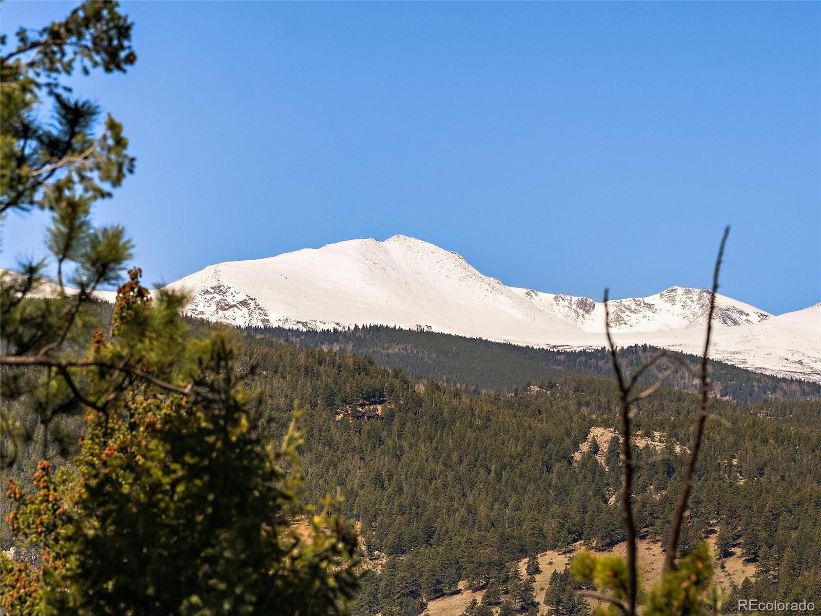 Lynx Lair Road Evergreen, CO 80439 - Photo 1 of 30 a view of a mountain
