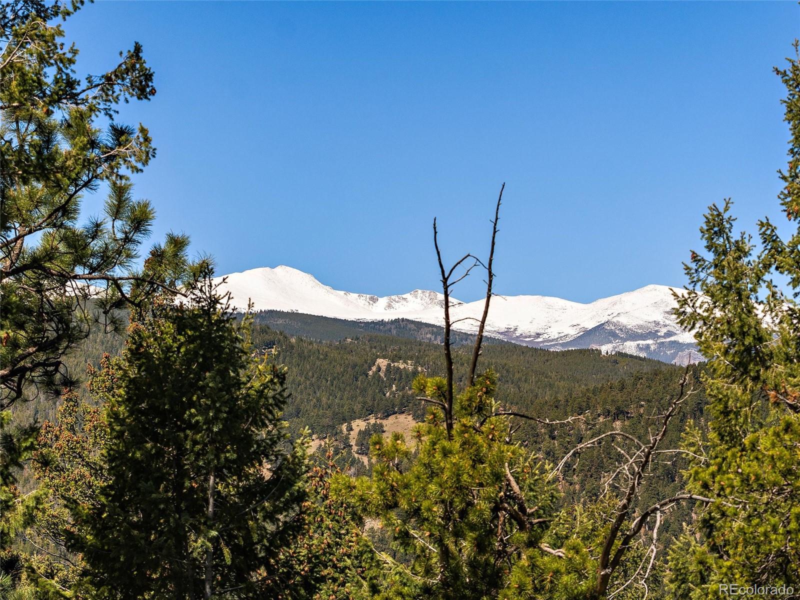 Lynx Lair Road Evergreen, CO 80439 - Photo 27 of 30 a view of mountain view with mountains in the background