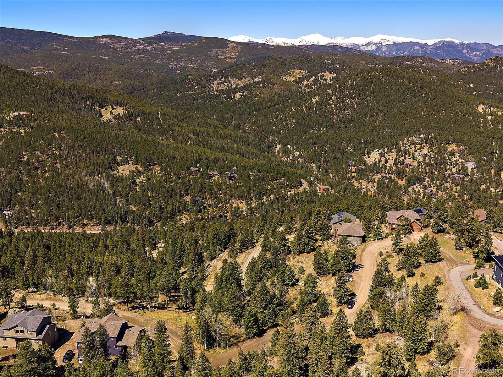 Lynx Lair Road Evergreen, CO 80439 - Photo 3 of 30 a view of city and mountain