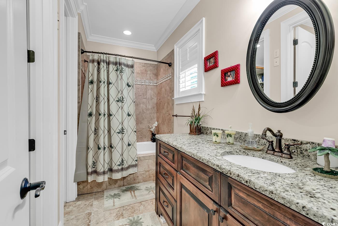 487 Trestle Way Conway, SC 29526 - Photo 21 of 40 Bathroom with shower / tub combo with curtain, vanity, ornamental molding, and recessed lighting