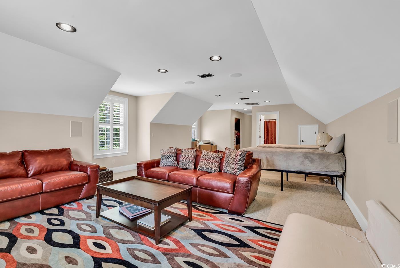 487 Trestle Way Conway, SC 29526 - Photo 24 of 40 Living area with lofted ceiling, recessed lighting, and light carpet