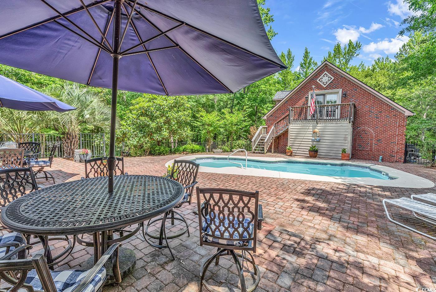487 Trestle Way Conway, SC 29526 - Photo 25 of 40 Swimming pool featuring stairs and a patio