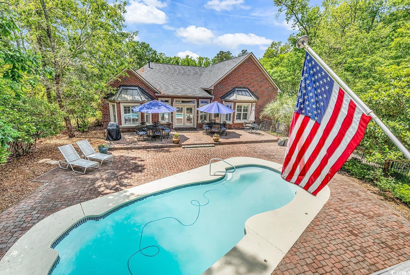 487 Trestle Way Conway, SC 29526 - Photo 26 of 40 View of pool with a patio area and outdoor dining space