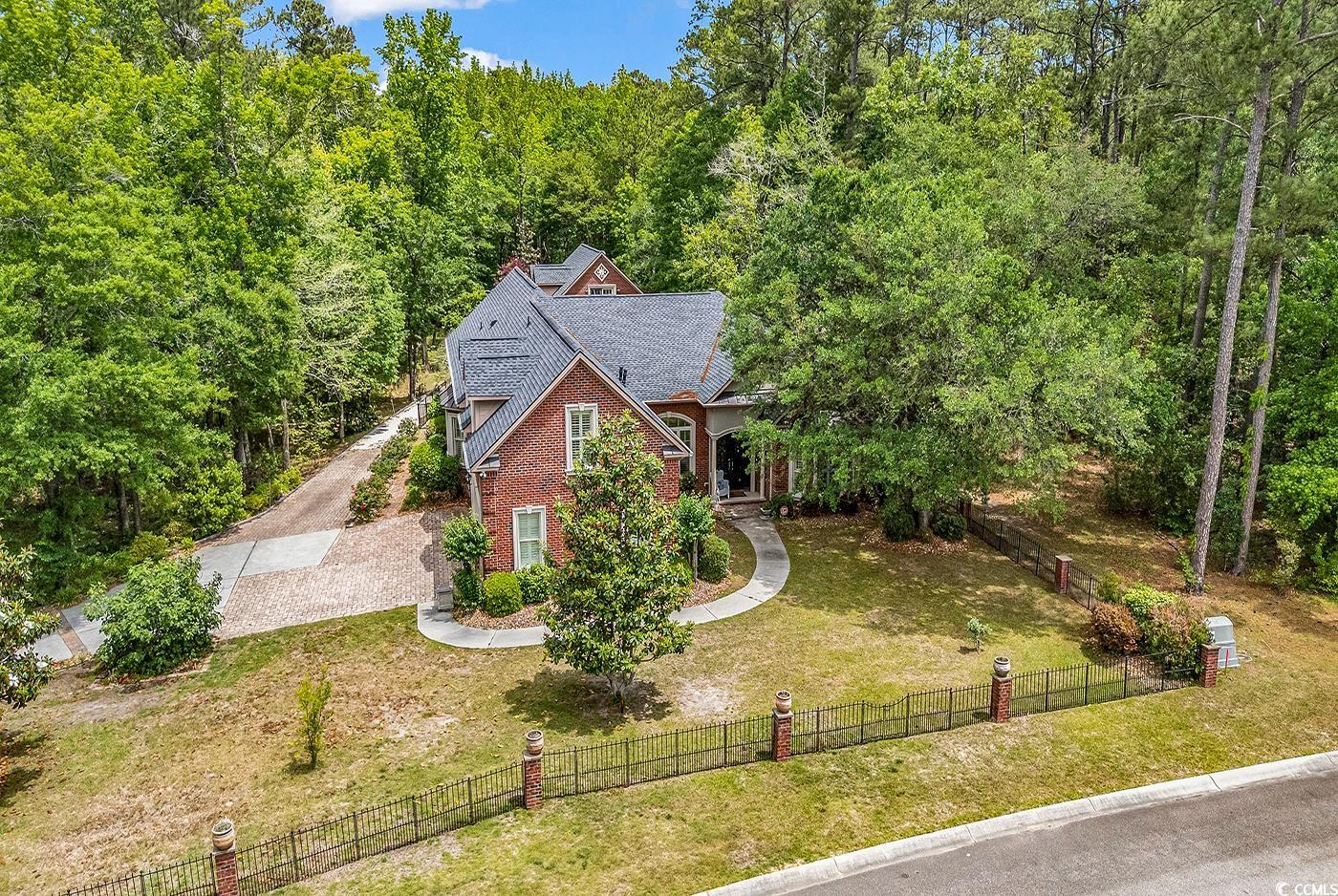 487 Trestle Way Conway, SC 29526 - Photo 36 of 40 View of front of house with driveway and a forest view