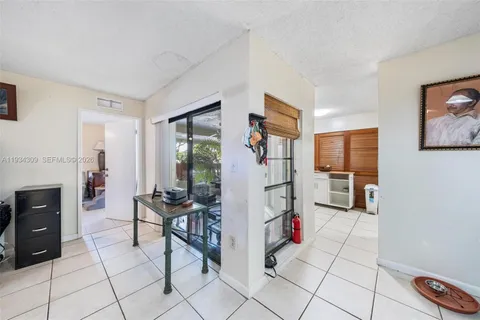 a view of a livingroom with furniture and a fireplace