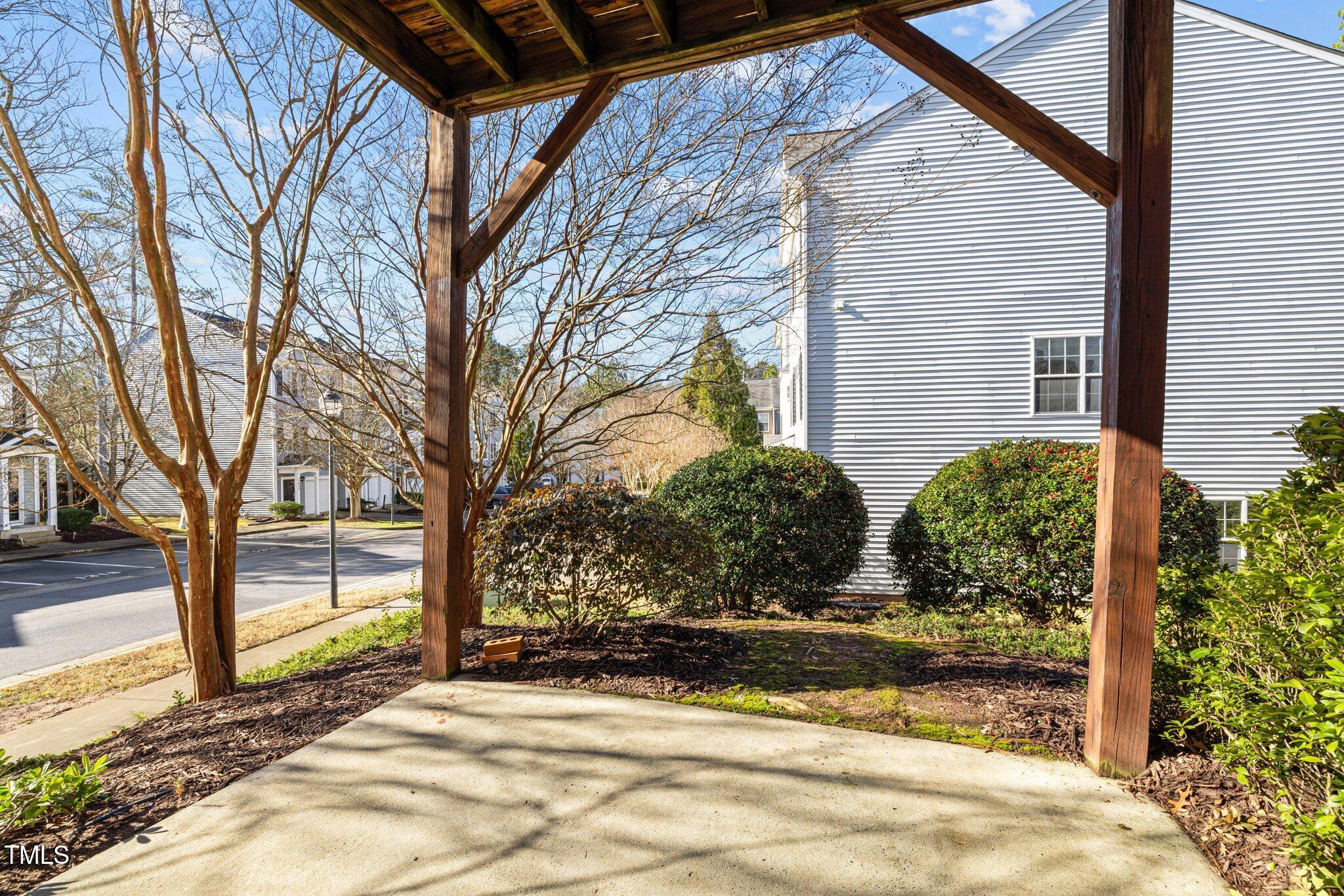 1674 Snow Mass Way Durham, NC 27713 - Photo 7 of 30 a view of a backyard with large trees