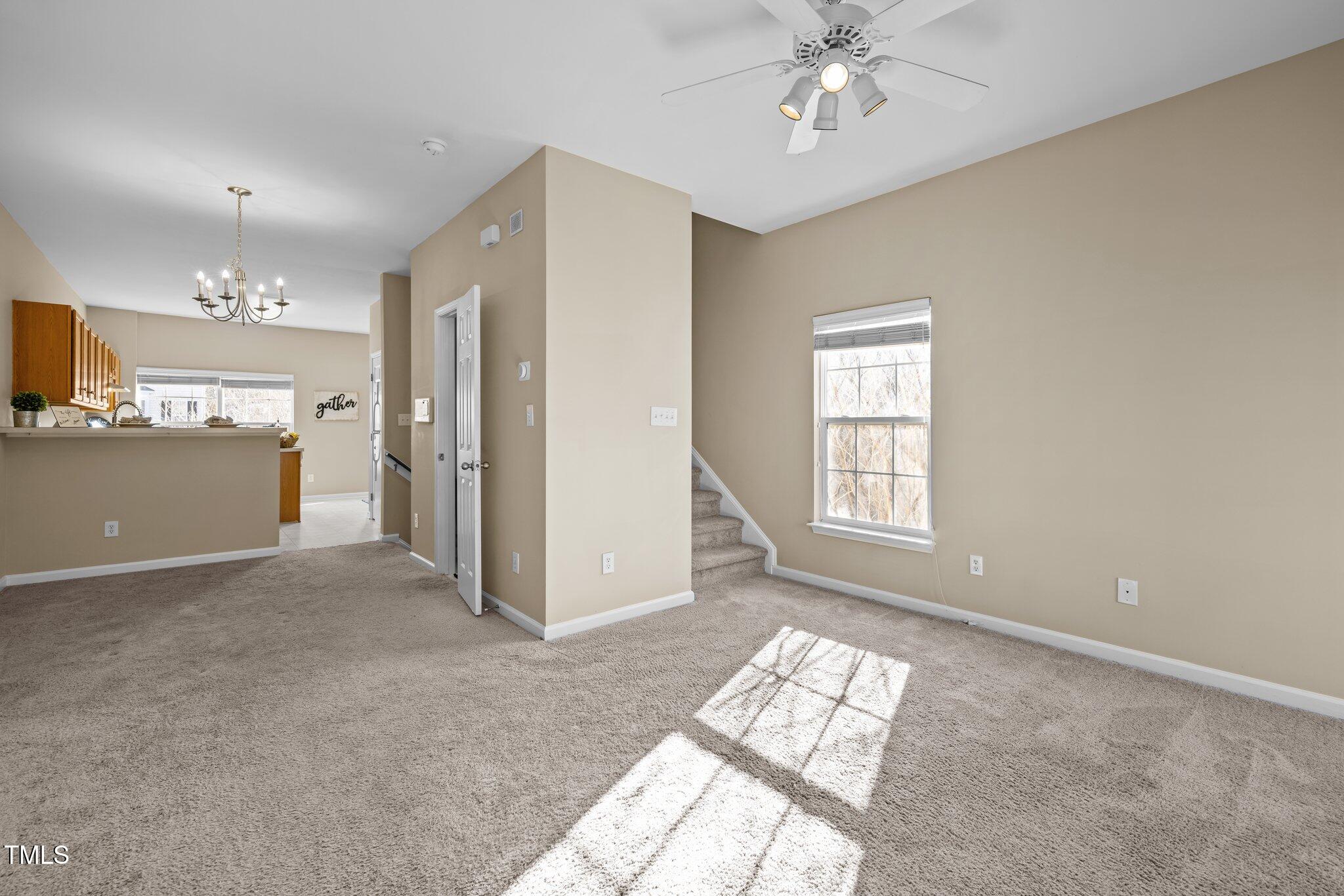 1674 Snow Mass Way Durham, NC 27713 - Photo 10 of 30 a view of livingroom with hardwood floor and a ceiling fan