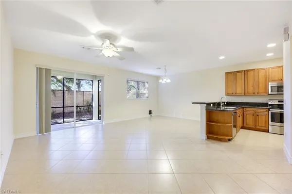 an aerial view of house with yard swimming pool and outdoor seating