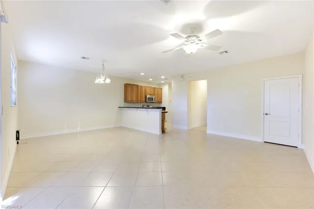 a view of a kitchen with a sink cabinets and window
