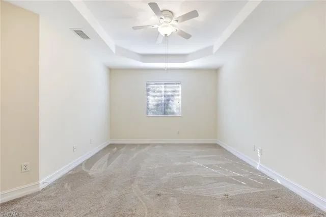 a kitchen with a stove a sink and a cabinet
