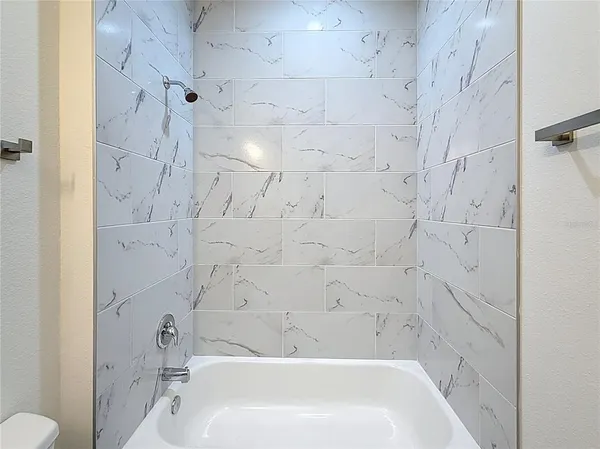 a bathroom with a bathtub