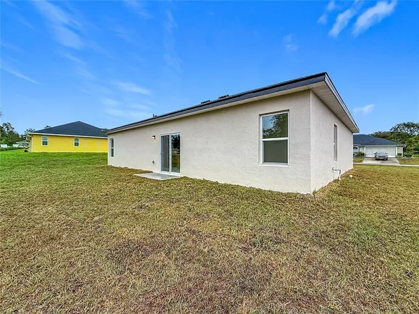 a house view with a outdoor space