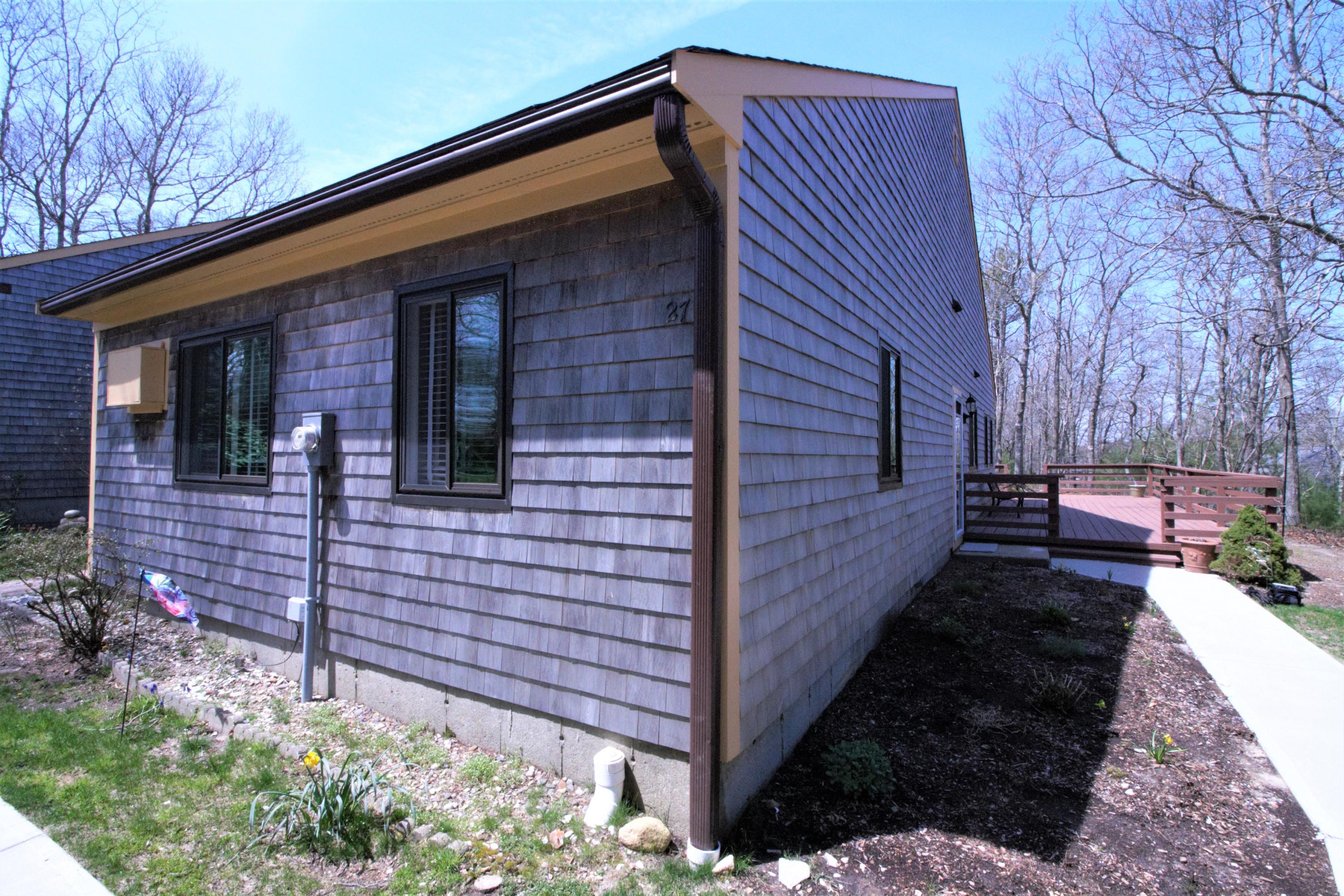 27 Round House Road Bourne, MA 02532 - Photo 2 of 13 a view of a house with a yard