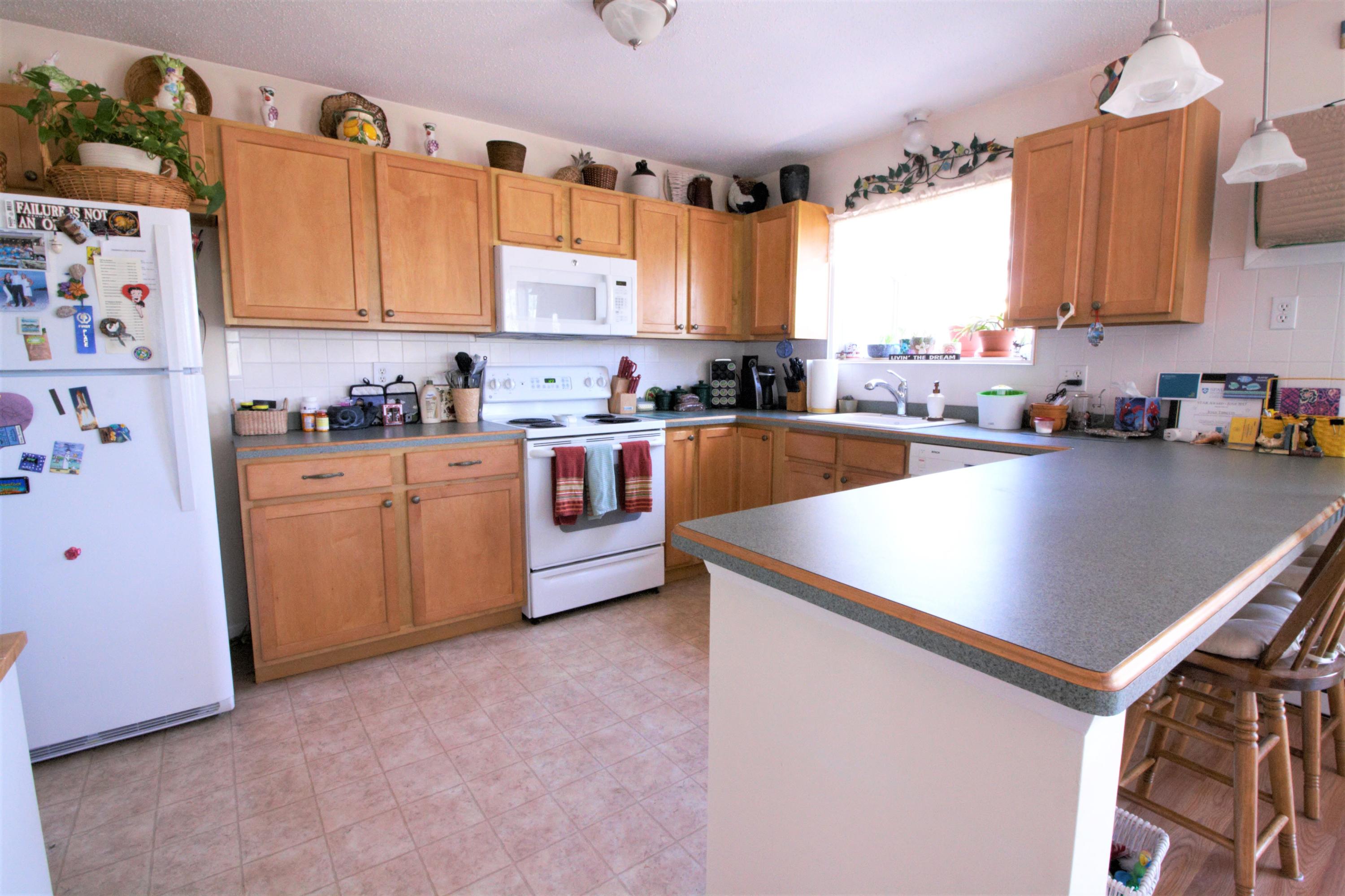 27 Round House Road Bourne, MA 02532 - Photo 6 of 13 a kitchen with sink cabinets and window