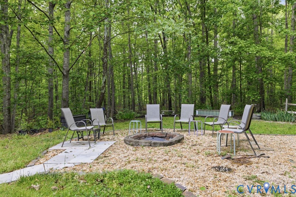 1061 Turkey Ridge Drive Moseley, VA 23120 - Photo 44 of 51 a view of chair and chairs in the yard