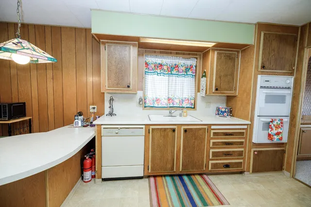 a view of room with furniture and windows