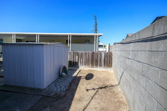 a view of a swimming pool with a lounge chairs